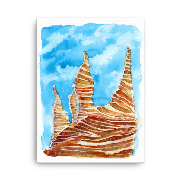 18x24 inches Psychedelic Sedona Red Rocks Southwestern wall art watercolor Canvas Print. Stylized American Southwest watercolor canvas print. Visual art piece streaked with red stripes, softened with earthy greens pine trees and blue sky, against a white wall.  Archival print of original high desert watercolor painting of illustrator and artist Patricia Jacques.  Punch of color for for minimalist home decor, a children’s room or a colorless space. Exudes magical realism and playfulness.