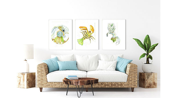 Yellow and black stylized psychedelic crustacean watercolor Canvas Print in a set of three paintings. Atmospheric, painted illustration. Colorful visual art piece of animal art against a white wall above a sofa with two other watercolor wall art in the slow travel Vietnam collection.  Dragon and Phoenix, Phoenix Rising. Timeless, archival print of original watercolor painting of illustrator and artist Patricia Jacques.  Exudes magical realism with classy, elegance.
