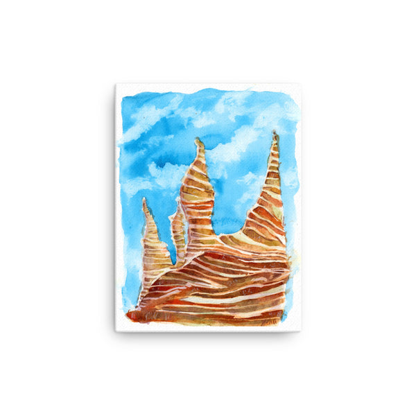 12x16 inches Psychedelic Sedona Red Rocks Southwestern wall art watercolor Canvas Print. Stylized American Southwest watercolor canvas print. Visual art piece streaked with red stripes, softened with earthy greens pine trees and blue sky, against a white wall.  Archival print of original high desert watercolor painting of illustrator and artist Patricia Jacques.  Punch of color for for minimalist home decor, a children’s room or a colorless space. Exudes magical realism and playfulness.